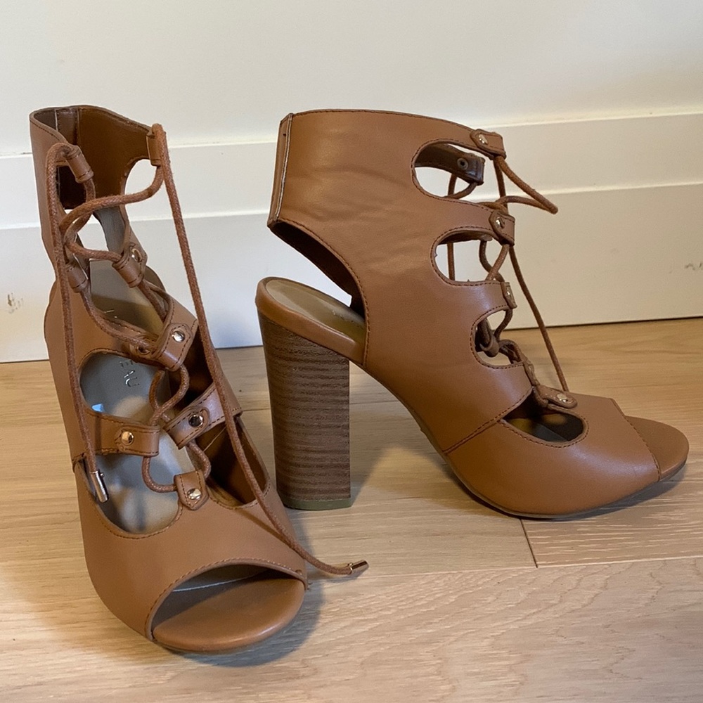Brand new, never worn 4 inch lace up block heels
